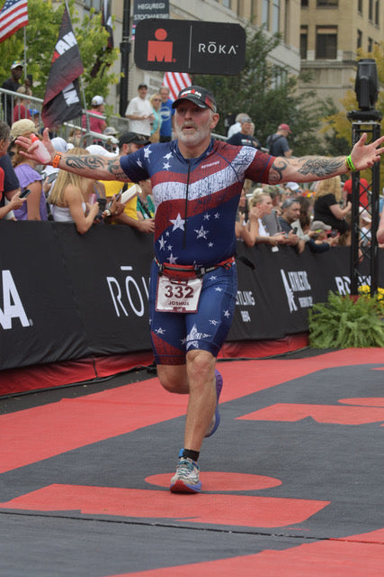 Josh Mietelski at the Ironman Wisconsin finish line